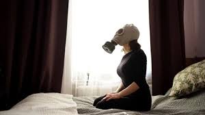 White girl removes gas mask in the sun ...