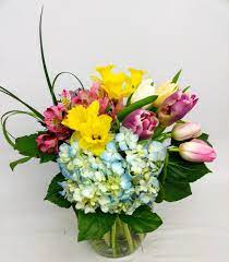 Spring Bouquet With Tulips Daffodils Hydrangea And Alstromaria With Bear Grass Spring Is Coming Flower Delivery Order Flowers Hydrangea Bouquet