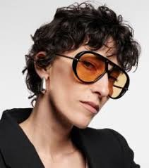 WornOnTV: Kyle's black metallic stripe shirt and mini skirt