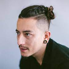 The Latest Men S Hair Trend Is The New Man Bun Top Knot Hairstyles Long Hair Styles Men Long Hair Styles