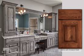 This tub surround was designed to have hidden storage for towels, rubber ducks, and extra soaps and bath beads. Vanities Bathroom Cabinets Haas Cabinets