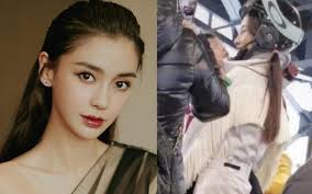 Angela Baby bỏ mặc Huỳnh Hiểu Minh, bám càng người khác đưa quý tử đi chơi