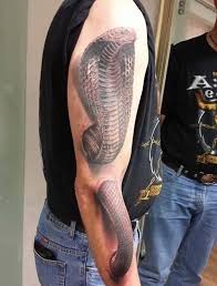This can be rendered with the help of other props like a basket and a pair of dice. Scary Snake Tattoose On The Leg Attractive Snake Tattoo On Leg For Girls Get Some Snake Tattoo Design Inspirations For Your Next Inking