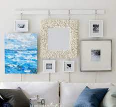 Online art gallery is the place to buy artworks online, find the best original paintings, fine arts and more from the largest online art gallery brings it to you various artworks at an affordable prices. 32 Coastal Gallery Walls Inspiration Ideas To Create A Compelling Wall Art Display Coastal Decor Ideas Interior Design Diy Shopping