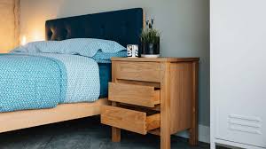 A solid wooden bedside table with three drawers for your bedside essentials. Shaker 3 Drawer Bedside Chest In Oak Natural Bed Company