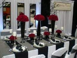 Black & white tablescape use a couple of yards of fabric as a table topper and makes a statement with a bold pattern. White Wedding Decorations Black And White Wedding Theme Red Wedding Decorations