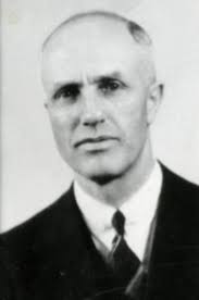 Edward V. Gorringe in his Oakley, Idaho harness shop, ca. 1920. Born May  24, 1869 at Bountiful, Utah to William and Fannie Gorringe, who were  natives of England. On June 18, 1895