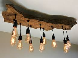 Medium Live Edge Olive Wood Chandelier Light Fixture With Etsy Wood Chandelier Wood Light Fixture Wood Light
