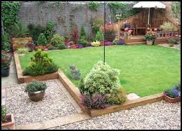 First of all, it serves to beautify the lawn, then it keeps animals. Sleeper Garden Edging Ideas Google Search Wooden Garden Edging Sleepers In Garden Back Garden Design