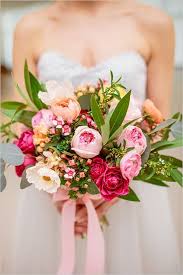 Yellow is a quintessential spring color, and we love how cheerful it looks when paired with a soft peach with a minimalist wedding dress, this peach cymbidium orchid and yellow rose bouquet is utterly. Modern Meets Organic Spring Wedding Bridal Bouquet Spring Wedding Bouquets Pink Summer Wedding Bouquets