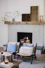 A fireplace surround is an architectural element which surrounds a fireplace, providing aesthetic and safety benefits. Brick Fireplace Makeover Using Cement Wood Mantel Boxwood Ave