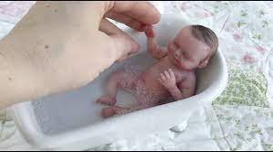 Stick to bathing your infant every other day or so to avoid drying out their skin, but keep wiping their face, neck, and diaper area. Tiny Miniature Silicone Baby Bath Time Silicone Babies Baby Bath Time Baby Bath