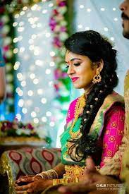 The traditional hairstyles in the south indian wedding scenario go with the basic plait, long and adorned with embellishments made of stones or, in a more traditional setting, a beautiful arrangement of flowers, often jasmine. 45 Gorgeous Bridal Hairstyles To Slay Your Wedding Look Bridal Look Wedding Blog