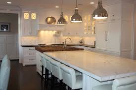 Suzie Grothouse Lumber Amazing Kitchen With White Shaker Kitchen Cabinets Pot Filler Kitchen Marble Top Marble Top Kitchen Island Square Kitchen