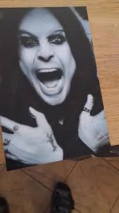 One airbrush painting of Ozzy in his honor by a colleague of mine.