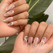 22 Spring Nail Art Designs To Try In 2021 Photos Allure 25+ spring nail polish colors that are trending this season. spring nail art designs to try in 2021