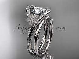 platinum diamond unique engagement set with a "Forever One" Moissanite  center stone ADLR166S