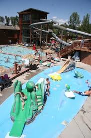 An indoor pool that offers you access to an outdoor terrace. These Colorado Swimming Pools Make Summer Vacation A Cool Destination The Denver Post