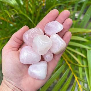 Tumbled Rose Quartz is the perfect supporting stone for grids focused on emotional healing and harmony., AI generated