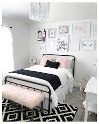 The print of this foyer's floral wallpaper is traditional enough, but in black and white it looks so fresh and exciting. Black And Blush Pink Girls Room Decor Black And White Teenage Girls Room Black Girl Room Ideas White Girls Rooms Black Room Decor Black Bedroom Furniture