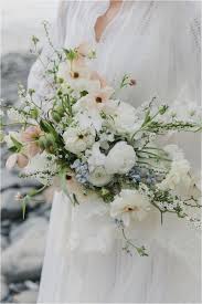 South portland, located across the harbor from portland, maine's largest city, is in many ways a contrast to its sister city — the fabulous one to the north known by foodies and fishermen. Cannon Beach Elopement Blue Wedding Bouquet Bridal Bouquet Spring Ranunculus Bridal Bouquet