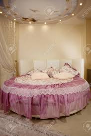 Modernize your bedroom with this special design round bed. Interior Of The Beautiful Bedroom With A Round Bed Stock Photo Picture And Royalty Free Image Image 67857250