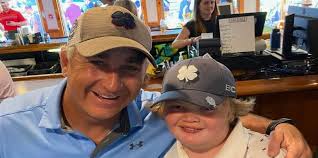 Two Hanover residents sink holes-in-ones at football team's fundraiser