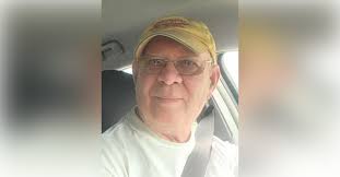 Obituary information for William "Sandy" Alexander Menard