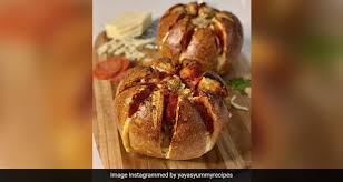 Remove from the oven, use a knife to check the middle. Viral Recipe This Pull Apart Pizza Bread Is A Delicious Snack That You Can Share Ndtv Food