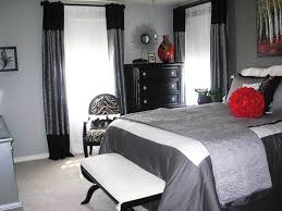 The bedside tables are made of metal and glass to add elegance to the overall design of the bedroom. Master Bedroom Red Black And Grey Bedroom Ideas Novocom Top