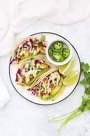 Using fork, break fish into chunks, and divide among warm shells. Fish Tacos With Honey Lime Cilantro Slaw The Local Catch Inc The Best Rhode Island Seafood