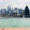 Traveler looking view skyline kuala lumpur city in swimming pool on the roof top of hotel at sunrise in kuala lumpur, malaysia. Https Encrypted Tbn0 Gstatic Com Images Q Tbn And9gcsgegxcmv6 Rgn2d5ddcolhh Mh1t3l Wwb9wy37 Bbukuwjjgk Usqp Cau