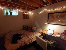Guests up in comfort or enjoy the bonus bedroom yourself with this professional advice for converting your basement. Bed Study Space And Pupper In My Cozy Basement Bedroom Femalelivingspace