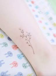 This classic flower displays many tiny, cloud like blooms covering its branches. 18 Simple Tattoo Ideas For Girls Who Live And Breathe Flowers Girlstyle Singapore