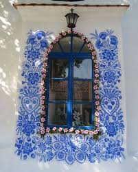 Anežka Kašpárková was a Czech folk artist renowned for her intricate blue  murals. Using traditional Moravian motifs, she adorned houses and buildings  in the village of Louka with delicate floral designs and