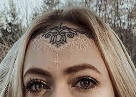 Image result for forehead tattoo