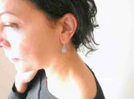 Small Art Deco silver earrings with sunburst