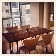 Flatiron Table And White Magnus Chairs From Restoration Hardware 60 Could Have Gone Bigger However Not A Bad Size For Loft Table Loft Living Dining Table