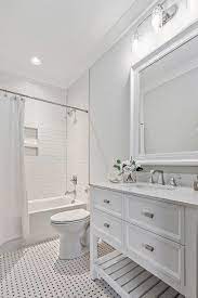 Maybe you would like to learn more about one of these? White Bathroom With Basketweave Floor Tiles Transitional Bathroom