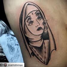 Purple slip dress by 1017 alyx 9 sm, featuring an asymmetrical front and bottom hem and triple strap detailing. Tatu Monashka S Krestom 16 02 2020 1017 Tattoo Nun With A Cross Tattoo Photo Ru Tattoo Photo Ru