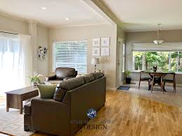 Smoky blue is a medium blue tone with a slightly gray undertone that will make this color blend flawlessly with our gray floor. Brown Wood Floors With Grey Furniture Sandpiper Living Room Remodel Brown Couch Living Room Grey Floors Create A Perfect Backdrop For This Home Displaying A Quirky Mix Of