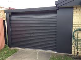 Graphite Grey Contemporary Garage Door With Matching Surround By Doors Direct Brisbane Garage Doors Garage Door Styles Contemporary Garage Doors