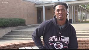 Gamecock football player mentors others