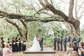 Customization available with blush, pick, red floral at an additional cost. Floral Ceremony Arch Installation How Much Does It Cost Chicago Style Weddings