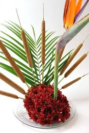 Centerpiece Bird Of Paradise Flower Arrangement This Thanksgiving And Fall Centerpiece Is A Turkey Made From Chrysanthemums A Bird Of Paradise And A Palm F Flower Centerpieces Centerpieces Fall Centerpiece