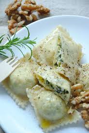 Between kneading and resting the dough, rolling the long silky sheets of pasta, assembling the layers. Home Made Ravioli Filled With Feta Cheese Parsley And Walnuts Ravioli Filling Homemade Pasta Pasta Dishes