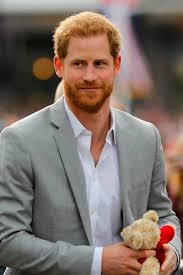 Britain S Prince Harry Carries A Teddy Bear He Was Given As He Greets Well Wishers On The Street Outside W Prince Harry Hot Prince Harry Prince Harry And Megan