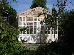 The simplest and most inexpensive greenhouse can be made with a few old pallets. The Green Lever Using Minimal Resources For Maximum Quality Of Life Home Made Low Cost Pallet Wood Greenhouse Viable Safe Year Round Food Production