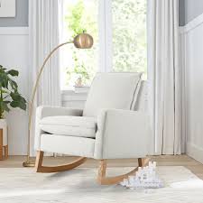This rocking armchair with refined and fluid lines combines comfort with a wonderful design. Paxton Convertible Rocker