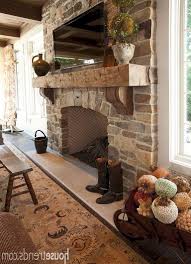Southwestern living room showcases a green ceiling lined with dark wood beams and yellow walls fixed with a stone brick fireplace below a. Pin On Shop
